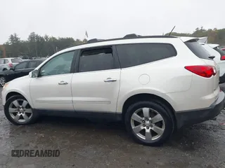 2011 Chevrolet Traverse LTZ with VIN 1GNKVLED5BJ385566, listed as a IAAI auction lot 40530314 with 166,155 mi miles and . Bid and sale history available at DreamBid. Image 14.