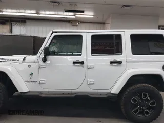 2017 Jeep Wrangler Unlimited Sahara with VIN 1C4BJWEG2HL700840, listed as a IAAI auction lot 42631036 with 60,610 mi miles and . Bid and sale history available at DreamBid. Image 14.