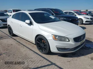2015 Volvo S60 T5 Drive-E Premier with VIN YV140MFK8F2338058, listed as a IAAI auction lot 41925114 with 215,979 mi miles. Bid and sale history available at carsss.com. Image 1.