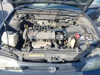 1997 Toyota Corolla with VIN 1NXBA02E5VZ595972, listed as a IAAI auction lot 41622050 with 143,577 mi miles and . Bid and sale history available at DreamBid. Image 10.