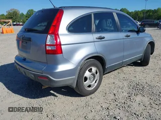 2009 Honda CR-V LX with VIN JHLRE48379C011817, listed as a IAAI auction lot 42059815 with 217,661 mi miles. Bid and sale history available at carsss.com. Image 4.
