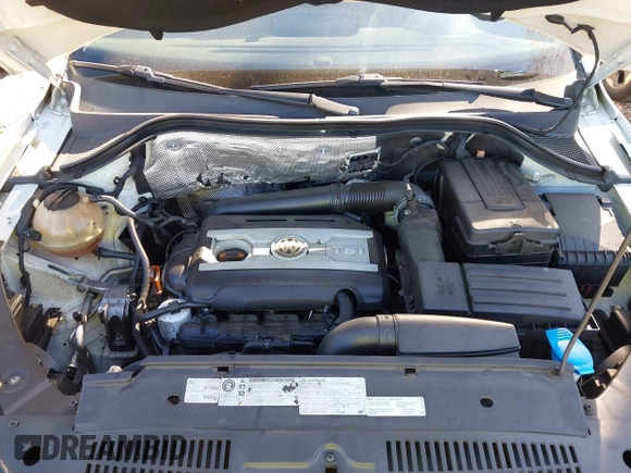 2012 Volkswagen Tiguan SE with VIN WVGAV7AX9CW590965, listed as a IAAI auction lot 41852407 with 153,953 mi miles and . Bid and sale history available at DreamBid. Image 10.
