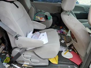 2016 Toyota Sienna LE with VIN 5TDJK3DC3GS134674, listed as a Copart auction lot 67357104 with 105,079 mi miles and Salvage Title. Bid and sale history available at carsss.com. Image 11.