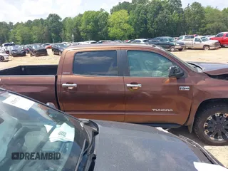 2014 Toyota Tundra Limited with VIN 5TFHW5F19EX400636, listed as a IAAI auction lot 42626818 with 267,402 mi miles and . Bid and sale history available at DreamBid. Image 13.