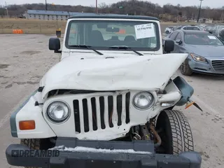 1998 Jeep Wrangler SE with VIN 1J4FY29P9WP793260, listed as a IAAI auction lot 41596990 with 90,766 mi miles. Bid and sale history available at carsss.com. Image 6.