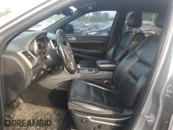 2014 Jeep Grand Cherokee Limited with VIN 1C4RJFBG8EC496303, listed as a Copart auction lot 56215195 with 129,269 mi miles and Salvage Title. Bid and sale history available at DreamBid. Image 7.