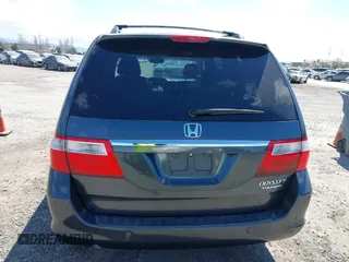 2005 Honda Odyssey TOURING with VIN 5FNRL38885B082482, listed as a IAAI auction lot 41879897 with 159,667 mi miles. Bid and sale history available at carsss.com. Image 16.