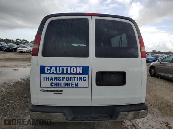 2014 Chevrolet Express Passenger LT z VIN 1GAZG1FG2E1154233, wystawiony jako Copart lot #63480385 z przebiegiem Nie podano mil oraz Nie do naprawy • Non repairable. Historia ofert i sprzedaży dostępna na DreamBid. Obrazek 6.