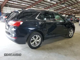2019 Chevrolet Equinox Premier z VIN 2GNAXXEV6K6274298, wystawiony jako Copart lot #58002655 z przebiegiem 150 462 mil mil oraz Czysty tytuł • Clean title. Historia ofert i sprzedaży dostępna na DreamBid. Obrazek 3.
