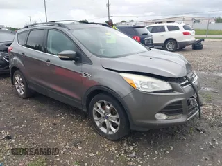 2013 Ford Escape SEL with VIN 1FMCU9HX4DUC75565, listed as a IAAI auction lot 42574351 with 180,876 mi miles and . Bid and sale history available at DreamBid. Image 1.