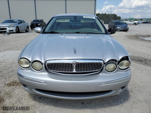 2005 Jaguar X-Type 3.0L with VIN SAJWA51C75WE23809, listed as a Copart auction lot 68457634 with 161,422 mi miles and Non Repairable. Bid and sale history available at carsss.com. Image 5.