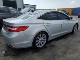 2013 Hyundai Azera z VIN KMHFH4JG8DA213103, wystawiony jako Copart lot #57781955 z przebiegiem 173 515 mil mil oraz Czysty tytuł • Clean title. Historia ofert i sprzedaży dostępna na DreamBid. Obrazek 3.