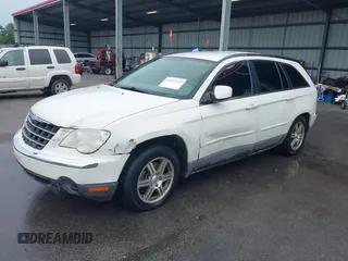 2007 Chrysler Pacifica Touring with VIN 2A8GM68X07R142333, listed as a IAAI auction lot 42197323 with 295,785 mi miles and . Bid and sale history available at DreamBid. Image 2.