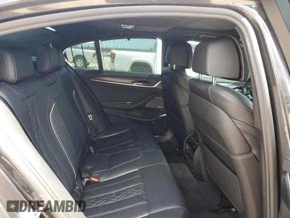 2022 BMW 5 Series M550i xDrive z VIN WBA13BK09NCJ00508, wystawiony jako Copart lot #58077634 z przebiegiem Nie podano mil oraz . Historia ofert i sprzedaży dostępna na DreamBid. Obrazek 10.