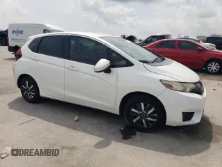 2016 Honda Fit LX with VIN JHMGK5H57GX009204, listed as a Copart auction lot 57129695 with 140,146 mi miles and Salvage title. Bid and sale history available at DreamBid. Image 4.