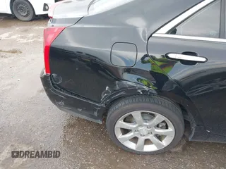 2014 Cadillac ATS Luxury AWD z VIN 1G6AH5R30E0150854, wystawiony jako IAAI lot #42422421 z przebiegiem 96 713 mil mil oraz . Historia ofert i sprzedaży dostępna na DreamBid. Obrazek 6.