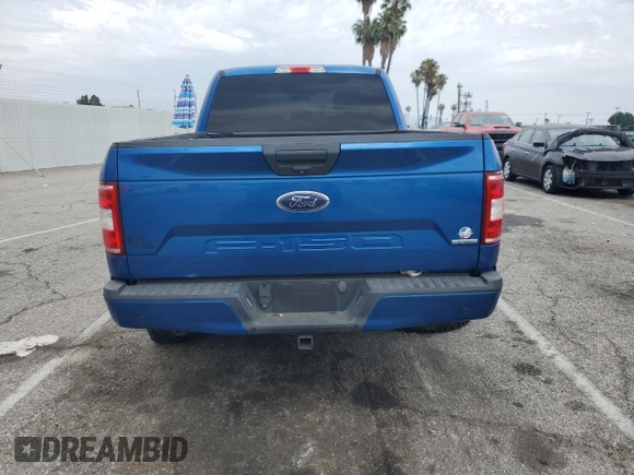 2018 Ford F-150 XL with VIN 1FTEX1CP9JKC83813, listed as a Copart auction lot 59342735 with 63,106 mi miles and Salvage title. Bid and sale history available at DreamBid. Image 6.