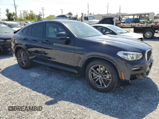 2021 BMW X4 xDrive30i z VIN 5UX2V1C09M9G11692, wystawiony jako Copart lot #51512115 z przebiegiem 16 948 mil mil oraz Szkoda całkowita • Salvage title. Historia ofert i sprzedaży dostępna na DreamBid. Obrazek 4.