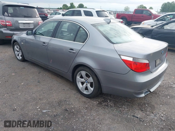 2005 BMW 5 Series 525i with VIN WBANA53535B857896, listed as a IAAI auction lot 42164290 with 207,711 mi miles. Bid and sale history available at carsss.com. Image 3.