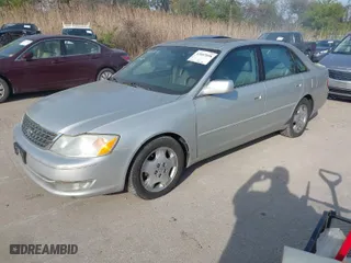 2003 Toyota Avalon XL with VIN 4T1BF28B53U302854, listed as a IAAI auction lot 42057098 with 230,127 mi miles. Bid and sale history available at carsss.com. Image 2.