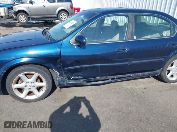 2003 Nissan Maxima SE z VIN JN1DA31D03T516575, wystawiony jako IAAI lot #42153623 z przebiegiem 176 446 mil mil oraz . Historia ofert i sprzedaży dostępna na DreamBid. Obrazek 6.