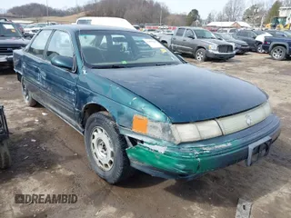 1995 Mercury Sable GS with VIN 1MELM50U8SA632936, listed as a IAAI auction lot 41695182 with 124,194 mi miles. Bid and sale history available at carsss.com. Image 1.