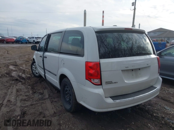 2014 Dodge Grand Caravan SE with VIN 2C4RDGBG9ER283848, listed as a IAAI auction lot 41666021 with 120,351 mi miles and . Bid and sale history available at DreamBid. Image 3.