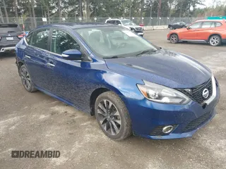 2019 Nissan Sentra S z VIN 3N1AB7AP3KY358451, wystawiony jako IAAI lot #41960388 z przebiegiem 129 478 mil mil oraz . Historia ofert i sprzedaży dostępna na DreamBid. Obrazek 1.
