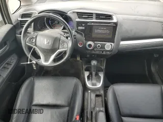 2015 Honda Fit EX-L with VIN 3HGGK5H88FM717933, listed as a Copart auction lot 60247355 with 103,170 mi miles and Salvage title. Bid and sale history available at DreamBid. Image 8.