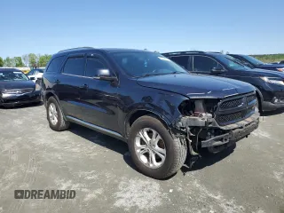2013 Dodge Durango Crew z VIN 1C4RDHDG3DC700276, wystawiony jako Copart lot #52290215 z przebiegiem 198 243 mil mil oraz Szkody całkowita. Historia ofert i sprzedaży dostępna na DreamBid. Obrazek 4.