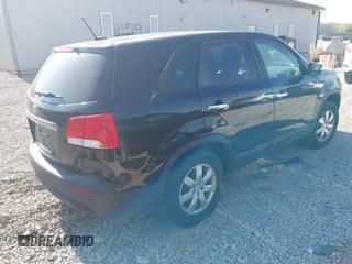 2011 Kia Sorento LX with VIN 5XYKT3A18BG007462, listed as a IAAI auction lot 42081727 with 183,594 mi miles and . Bid and sale history available at carsss.com. Image 4.