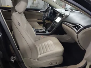 2018 Ford Fusion SE z VIN 3FA6P0LU3JR203864, wystawiony jako IAAI lot #41476335 z przebiegiem 49 246 mil mil oraz . Historia ofert i sprzedaży dostępna na DreamBid. Obrazek 5.