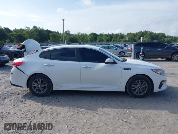 2020 Kia Optima LX with VIN 5XXGT4L30LG390927, listed as a IAAI auction lot 42642424 with 84,697 mi miles and . Bid and sale history available at DreamBid. Image 13.