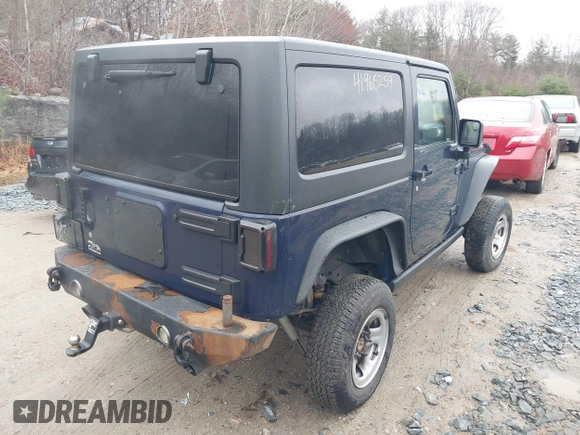 2013 Jeep Wrangler Rubicon 10th Anniversary with VIN 1C4BJWCG7DL544145, listed as a IAAI auction lot 41965259 with 125,900 mi miles and . Bid and sale history available at carsss.com. Image 4.