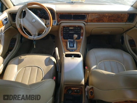 1996 Jaguar XJ with VIN SAJKX6747TC764559, listed as a Copart auction lot 48501775 with Not provided miles and Salvage title. Bid and sale history available at DreamBid. Image 8.