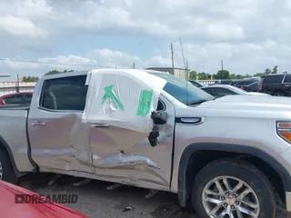 2020 GMC Sierra 1500 SLT z VIN 3GTU9DED9LG299417, wystawiony jako IAAI lot #42168562 z przebiegiem Nie podano mil oraz . Historia ofert i sprzedaży dostępna na DreamBid. Obrazek 13.