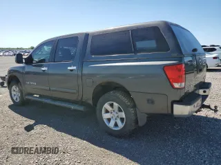 2005 Nissan Titan LE with VIN 1N6BA07B95N571880, listed as a Copart auction lot 57527435 with 199,577 mi miles and Salvage title. Bid and sale history available at DreamBid. Image 2.