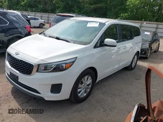 2016 Kia Sedona LX with VIN KNDMB5C11G6204116, listed as a IAAI auction lot 42153230 with 194,553 mi miles. Bid and sale history available at carsss.com. Image 2.