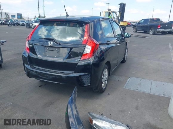 2015 Honda Fit LX z VIN 3HGGK5H52FM765921, wystawiony jako IAAI lot #42135740 z przebiegiem 82 647 mil mil oraz . Historia ofert i sprzedaży dostępna na DreamBid. Obrazek 4.