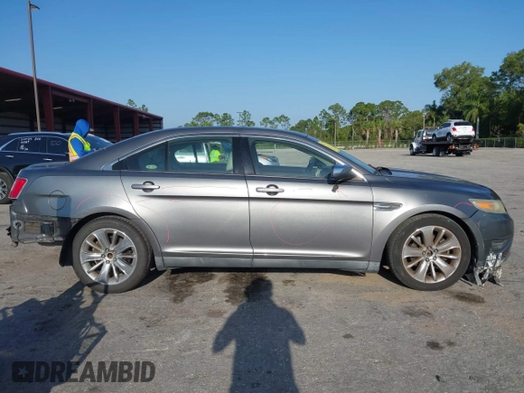 2011 Ford Taurus Limited with VIN 1FAHP2FW3BG117688, listed as a IAAI auction lot 41974469 with 215,036 mi miles and . Bid and sale history available at carsss.com. Image 14.