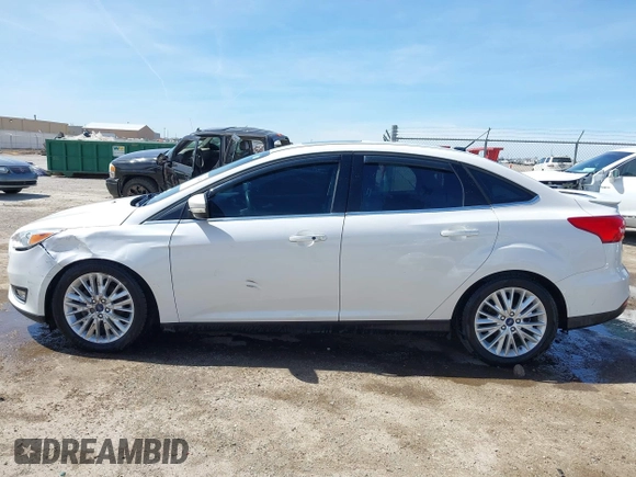 2015 Ford Focus Titanium с VIN 1FADP3J27FL341102, выставлен на аукционе IAAI как лот 41793450 с пробегом 96 465 миль миль и . История ставок и продаж доступна на DreamBid. Изображение 14.