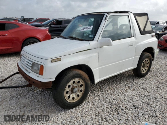 1994 Suzuki Sidekick z VIN 2S3TA01C8R6408593, wystawiony jako Copart lot #65011514 z przebiegiem 248 814 mil mil oraz Tytuł czysty. Historia ofert i sprzedaży dostępna na DreamBid. Obrazek 1.