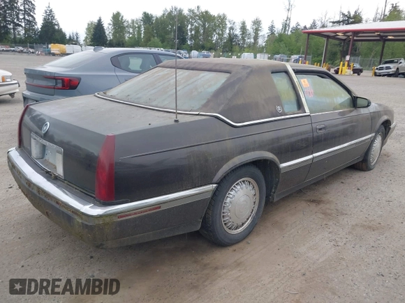 1992 Cadillac Eldorado z VIN 1G6EL13B0NU605624, wystawiony jako IAAI lot #42127549 z przebiegiem Nie podano mil oraz . Historia ofert i sprzedaży dostępna na DreamBid. Obrazek 4.