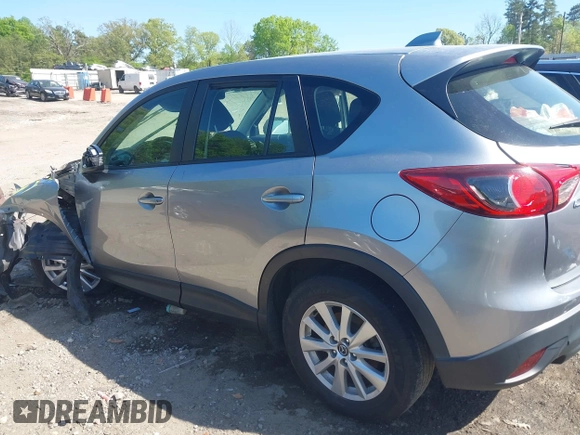 2013 Mazda CX-5 Sport z VIN JM3KE2BE9D0132928, wystawiony jako IAAI lot #41997589 z przebiegiem Nie podano mil oraz . Historia ofert i sprzedaży dostępna na DreamBid. Obrazek 13.