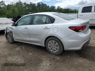 2020 Kia Rio S with VIN 3KPA24ADXLE323295, listed as a Copart auction lot 52176015 with 137,724 mi miles and Salvage Title. Bid and sale history available at carsss.com. Image 2.