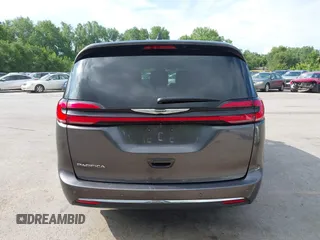 2023 Chrysler Pacifica Touring L with VIN 2C4RC1BG6PR612749, listed as a IAAI auction lot 42612932 with 69,931 mi miles and . Bid and sale history available at DreamBid. Image 16.