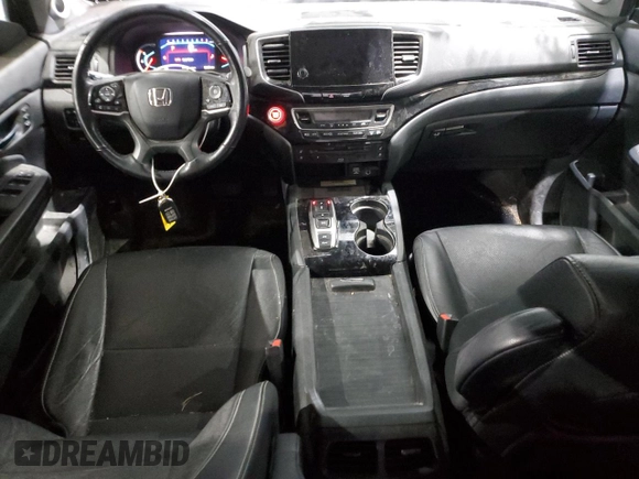 2021 Honda Pilot Elite with VIN 5FNYF6H05MB005324, listed as a Copart auction lot 82866734 with 126,630 mi miles and Salvage Title. Bid and sale history available at DreamBid. Image 8.