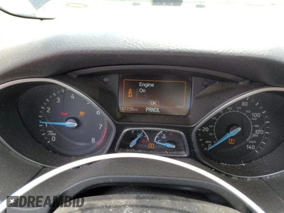 2018 Ford Focus SE z VIN 1FADP3F28JL319269, wystawiony jako Copart lot #59604555 z przebiegiem 167 726 mil mil oraz Szkoda całkowita • Salvage title. Historia ofert i sprzedaży dostępna na DreamBid. Obrazek 9.