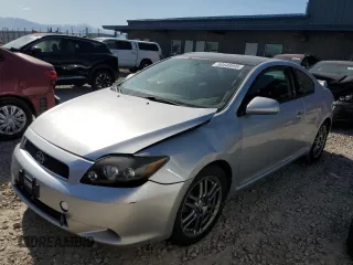2009 Scion tC z VIN JTKDE167590296040, wystawiony jako Copart lot #58440895 z przebiegiem 171 825 mil mil oraz Szkoda całkowita • Salvage title. Historia ofert i sprzedaży dostępna na DreamBid. Obrazek 1.