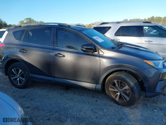 2016 Toyota RAV4 XLE with VIN 2T3WFREV0GW266691, listed as a IAAI auction lot 41804023 with 77,000 mi miles. Bid and sale history available at carsss.com. Image 13.